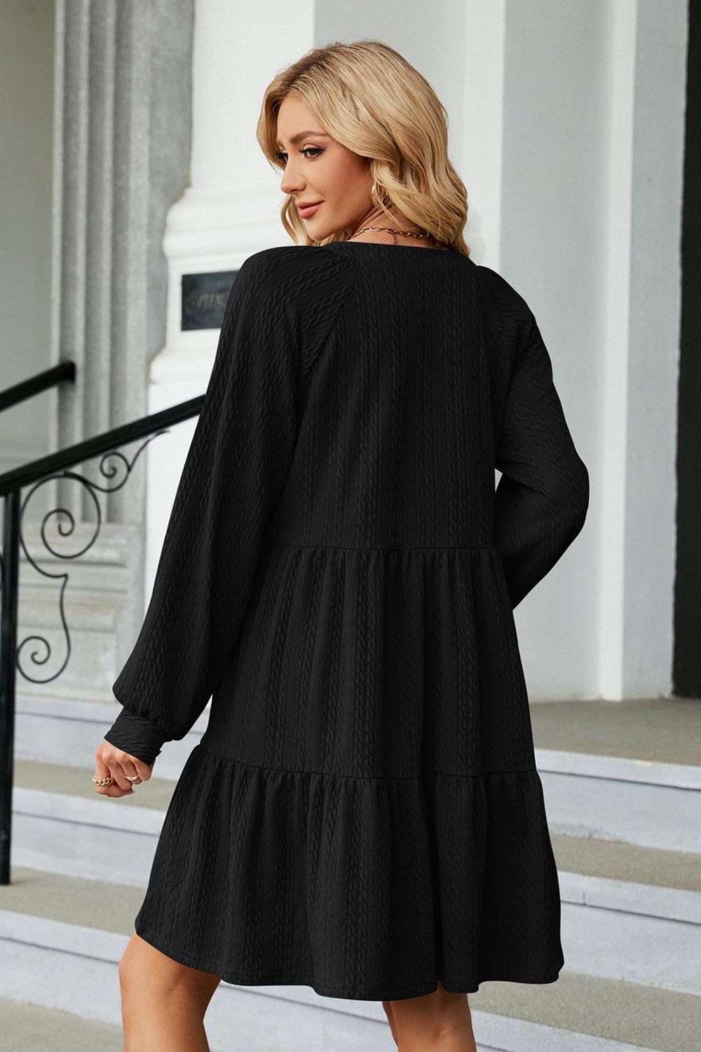 Black A-line mini dress additional model view