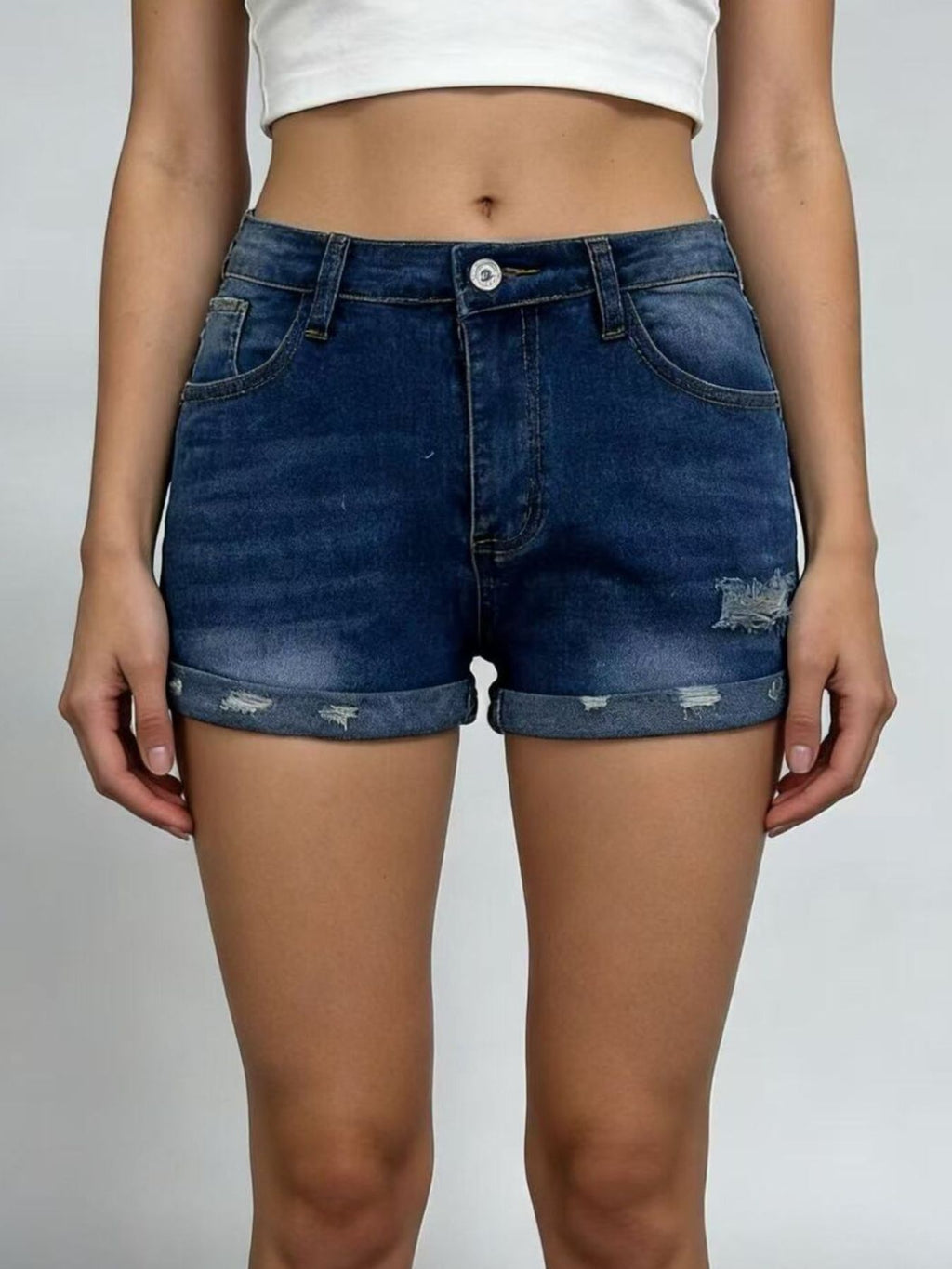 Women’s distressed denim roll-up shorts on model, image 8