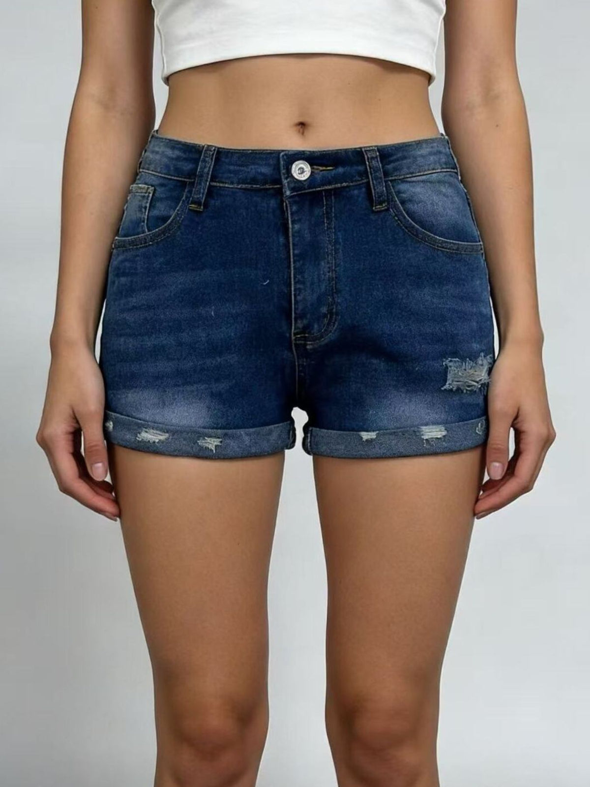 Women’s distressed denim roll-up shorts on model, image 8