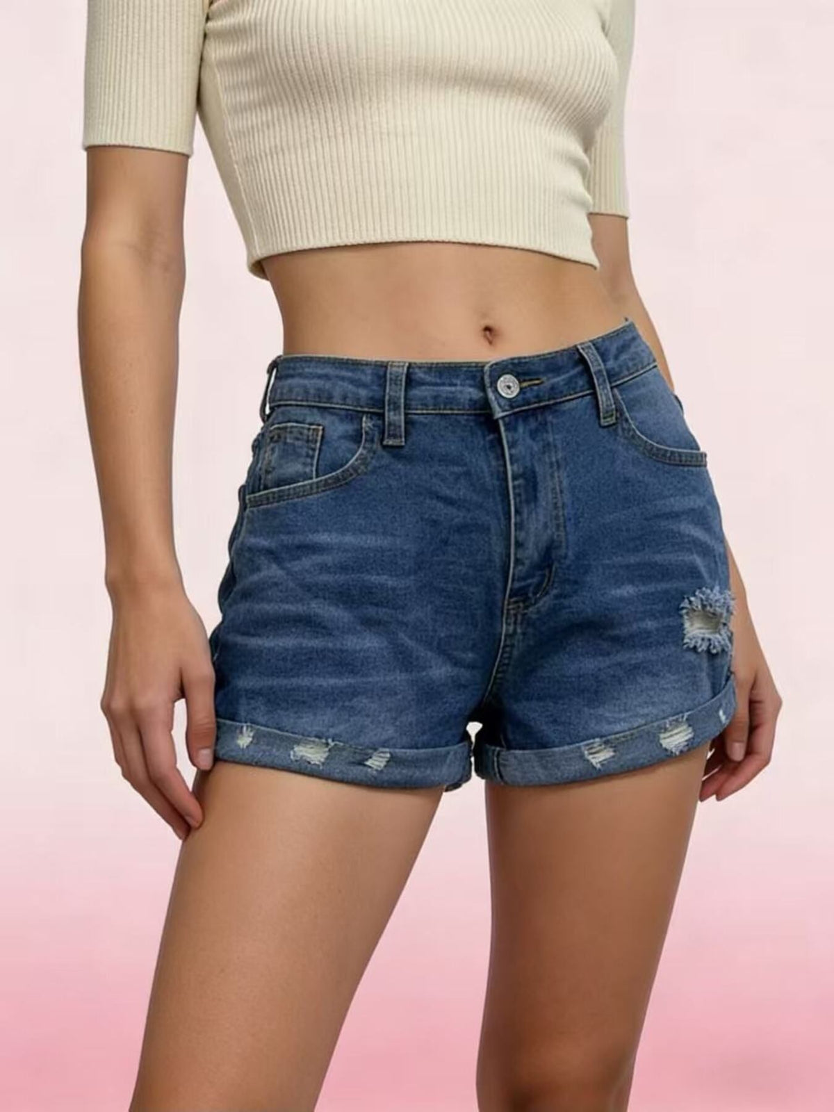 Women’s distressed denim roll-up shorts on model, image 11