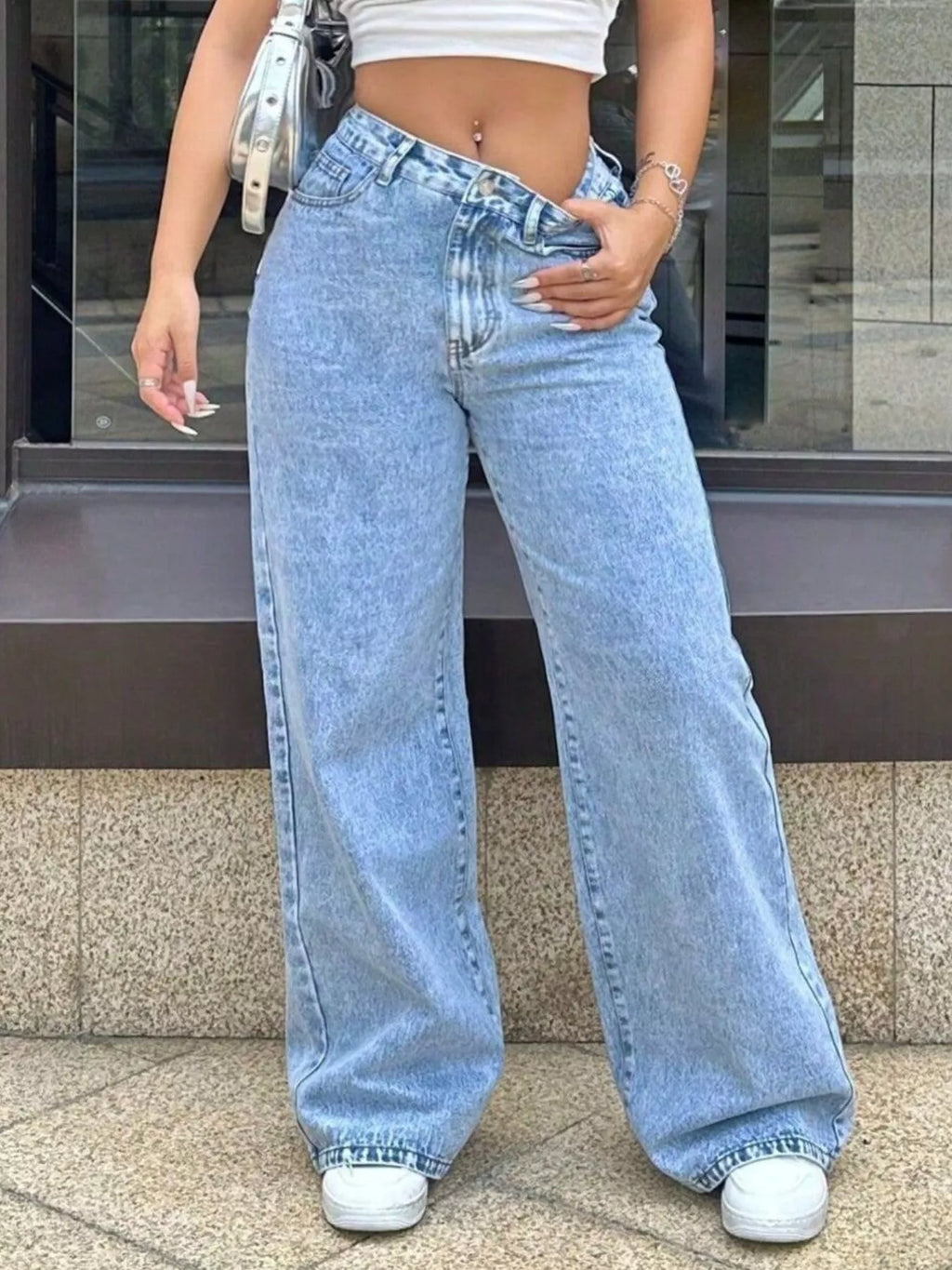 Women's cotton-blend wide-leg jeans in a light blue wash