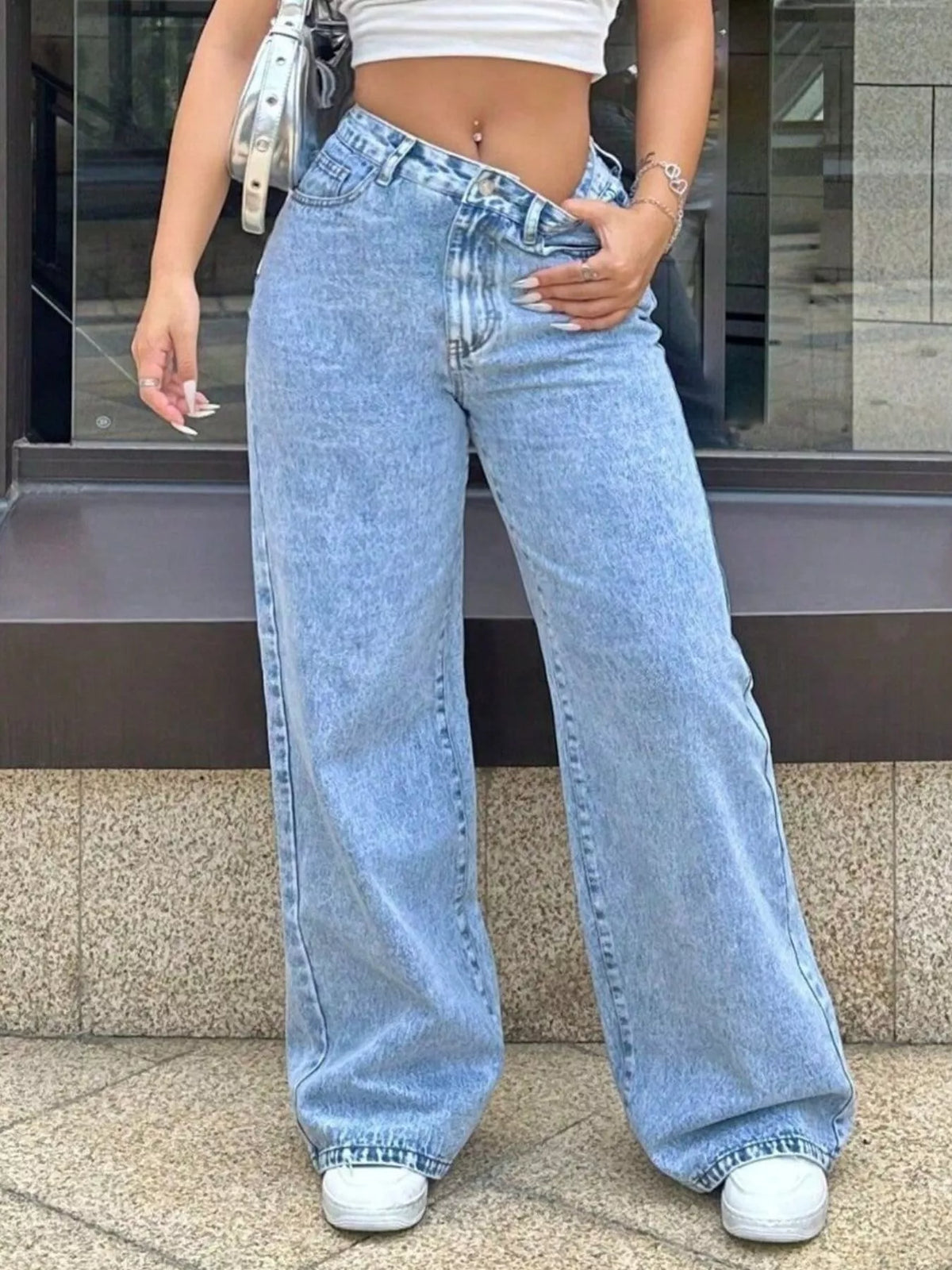 Women's cotton-blend wide-leg jeans in a light blue wash