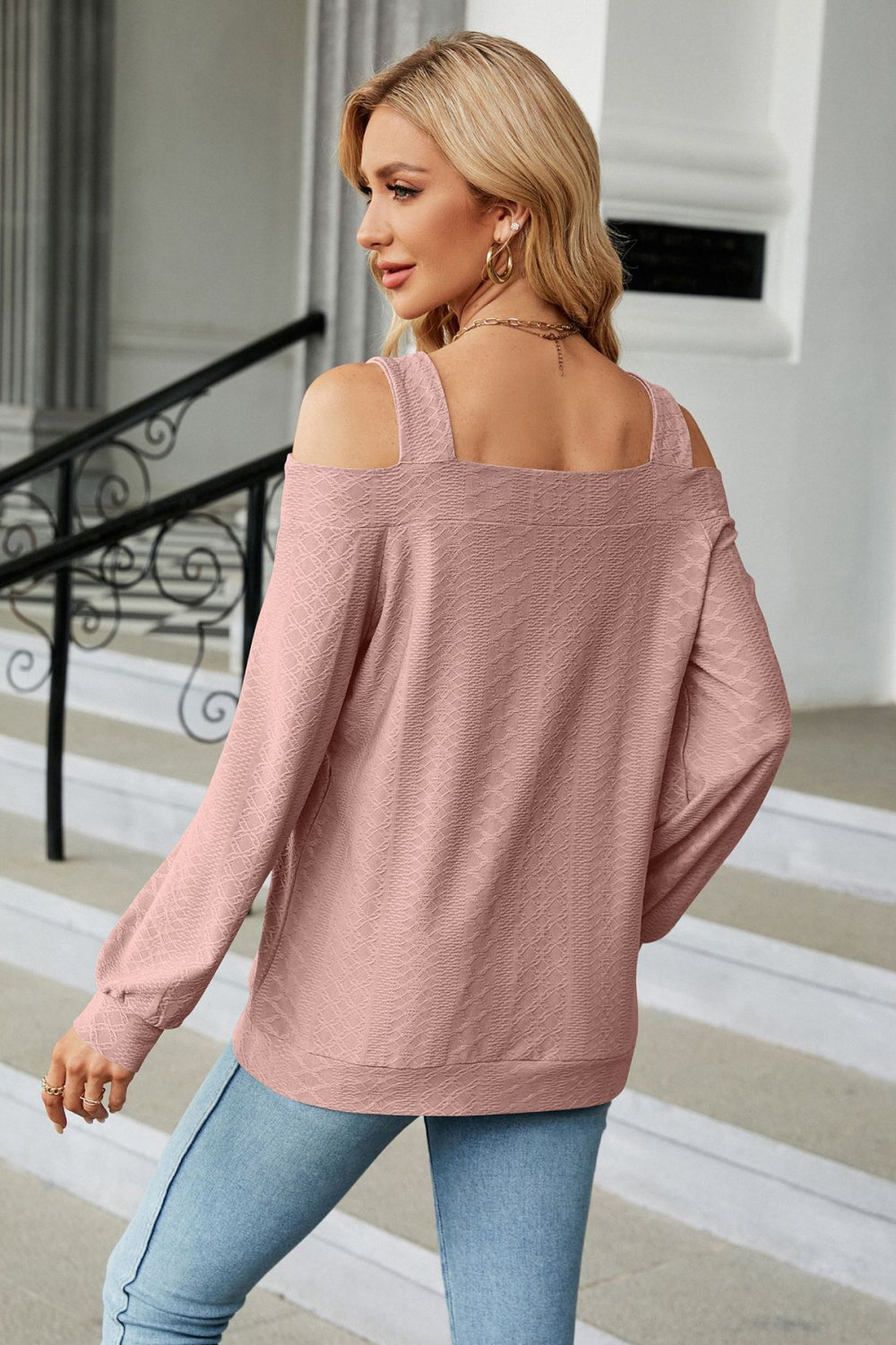 Long sleeve cutout blouse styled with denim