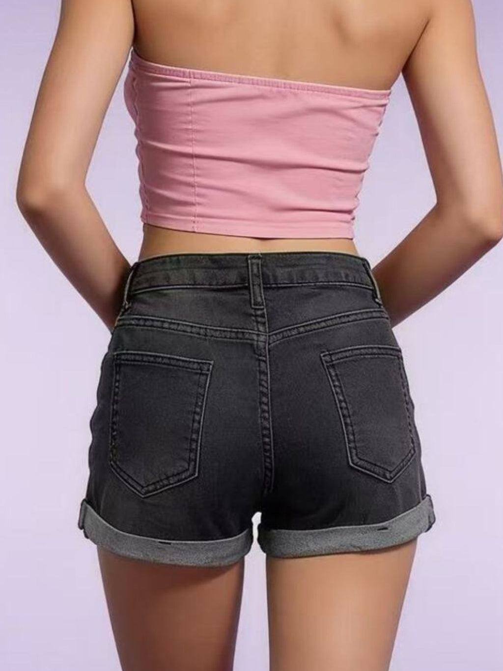 Women’s distressed denim roll-up shorts on model, image 5
