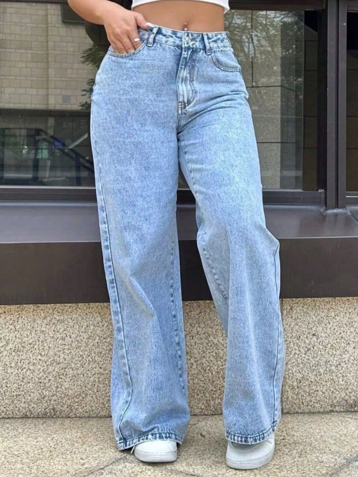 Light wash wide-leg jeans with functional pockets