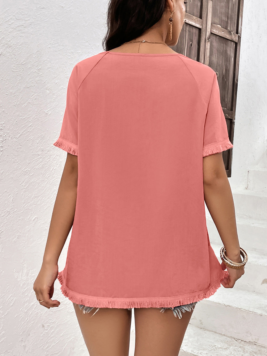 Coral longline top back view with fringe trim