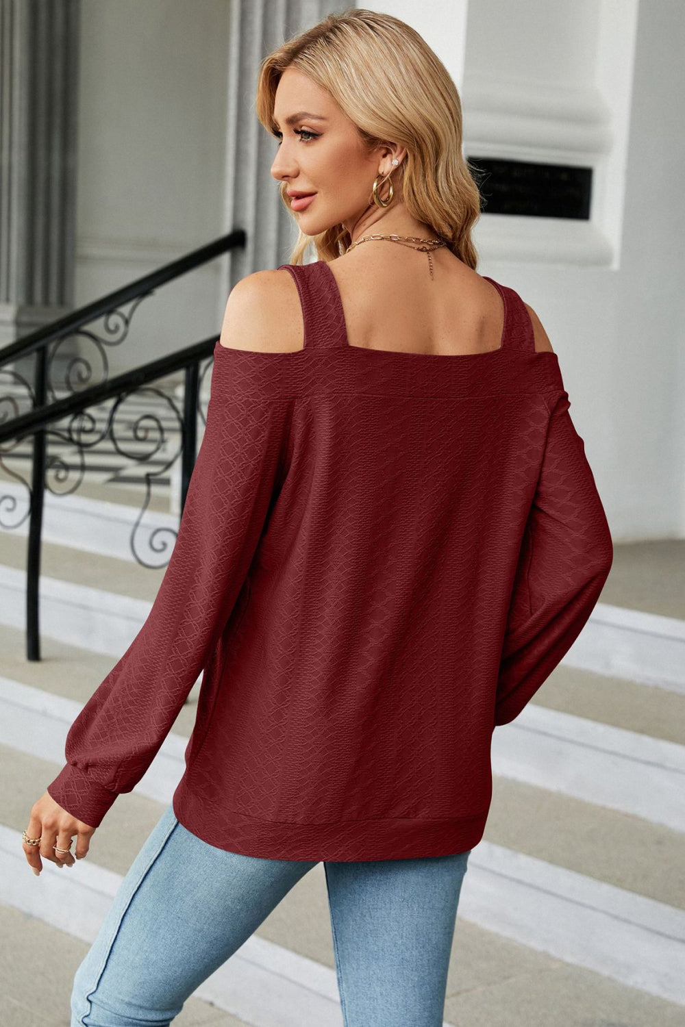 Rayon blend cold shoulder blouse on model