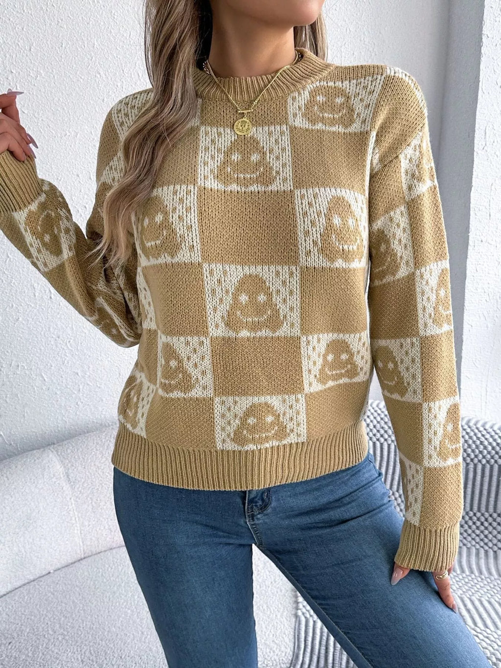 Women’s khaki cat sweater with checkerboard knit pattern
