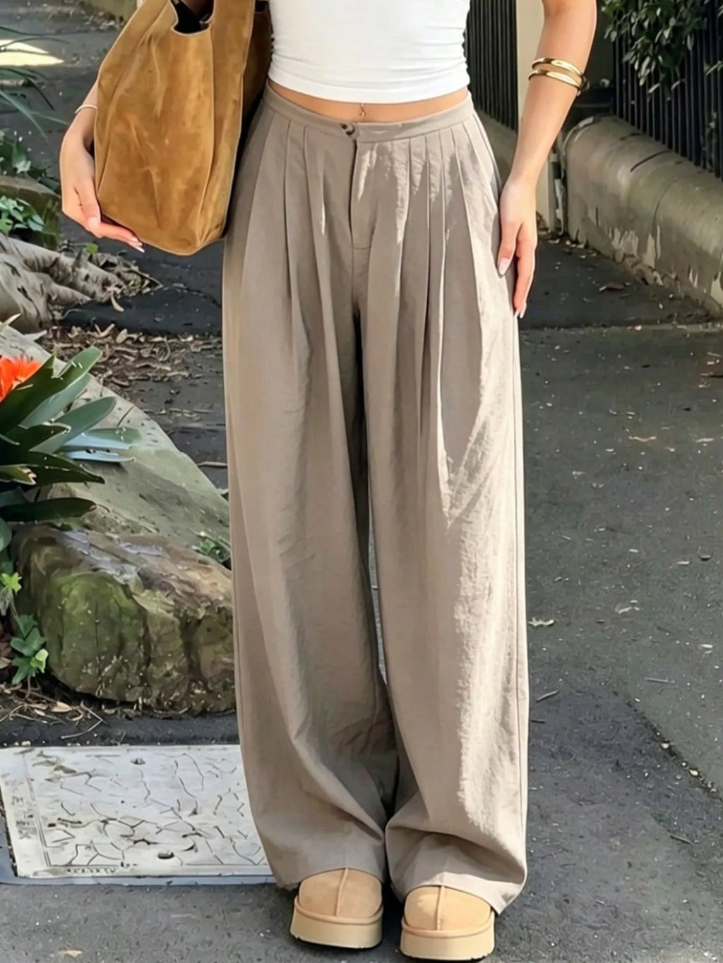 Women's khaki drawstring pants in a wide-leg silhouette
