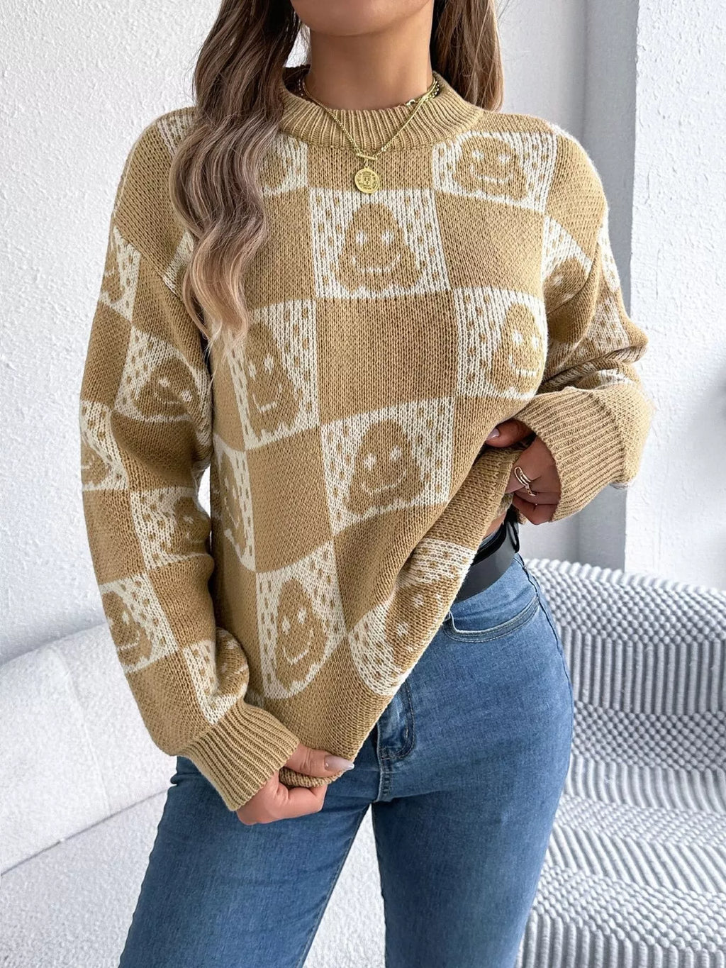 Khaki Halloween cat sweater styled with denim