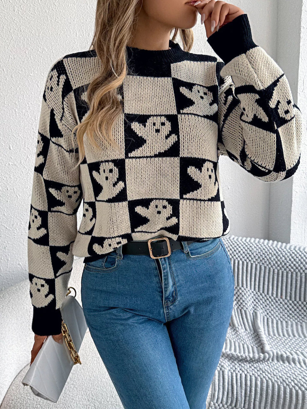 Women’s black checkerboard cat sweater for Halloween