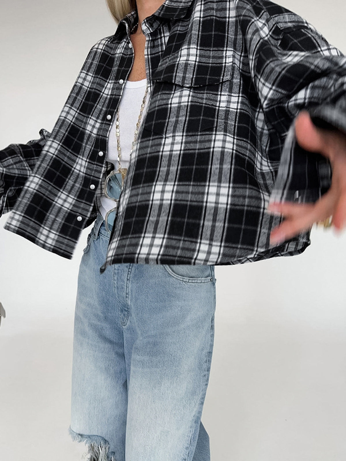 Women’s black and white oversized plaid button-up shirt