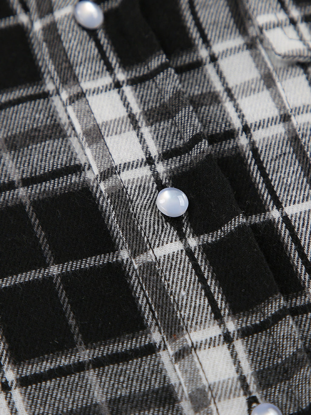 Women’s long sleeve plaid button-up shirt with pockets