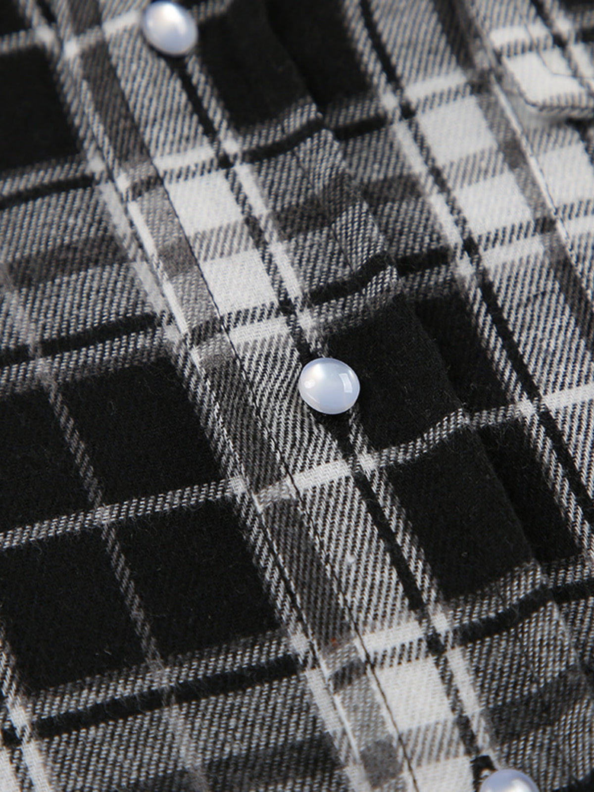 Women’s long sleeve plaid button-up shirt with pockets