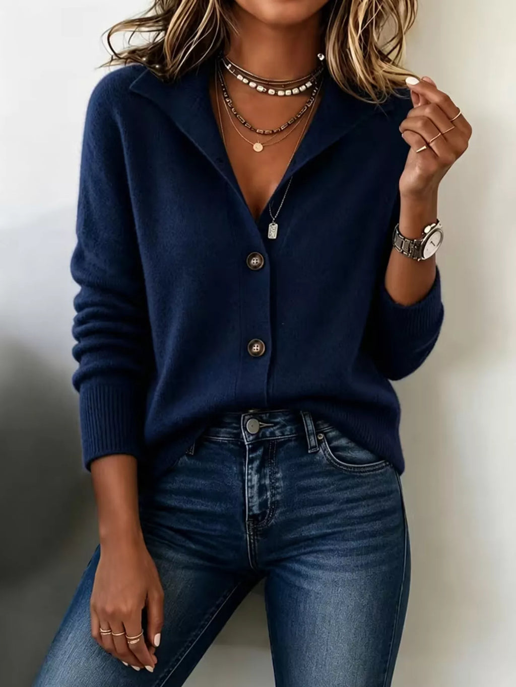 Women’s navy button-down knit cardigan showing button-front knit design