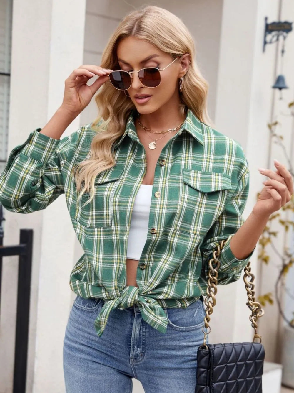 Women's pocketed plaid button-up long sleeve shirt