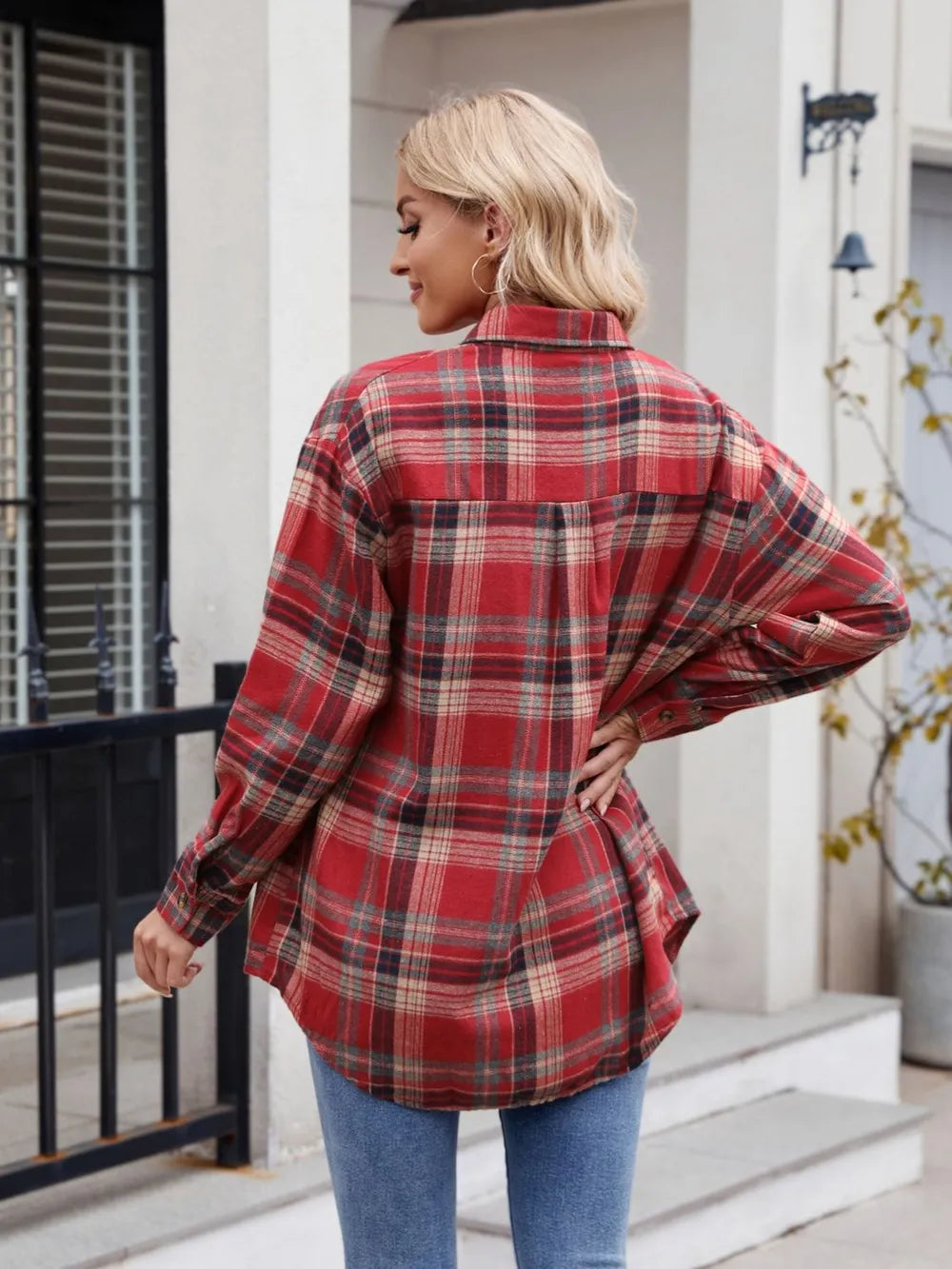 Women's plaid button-up shirt with pocket detail